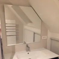 Miroir glace sous toit à angle coupé