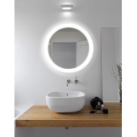Miroir rond éclairé pour chambre d'hôtel