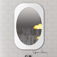 miroir ovale dans un cadre rectangulaire finition blanc élégant